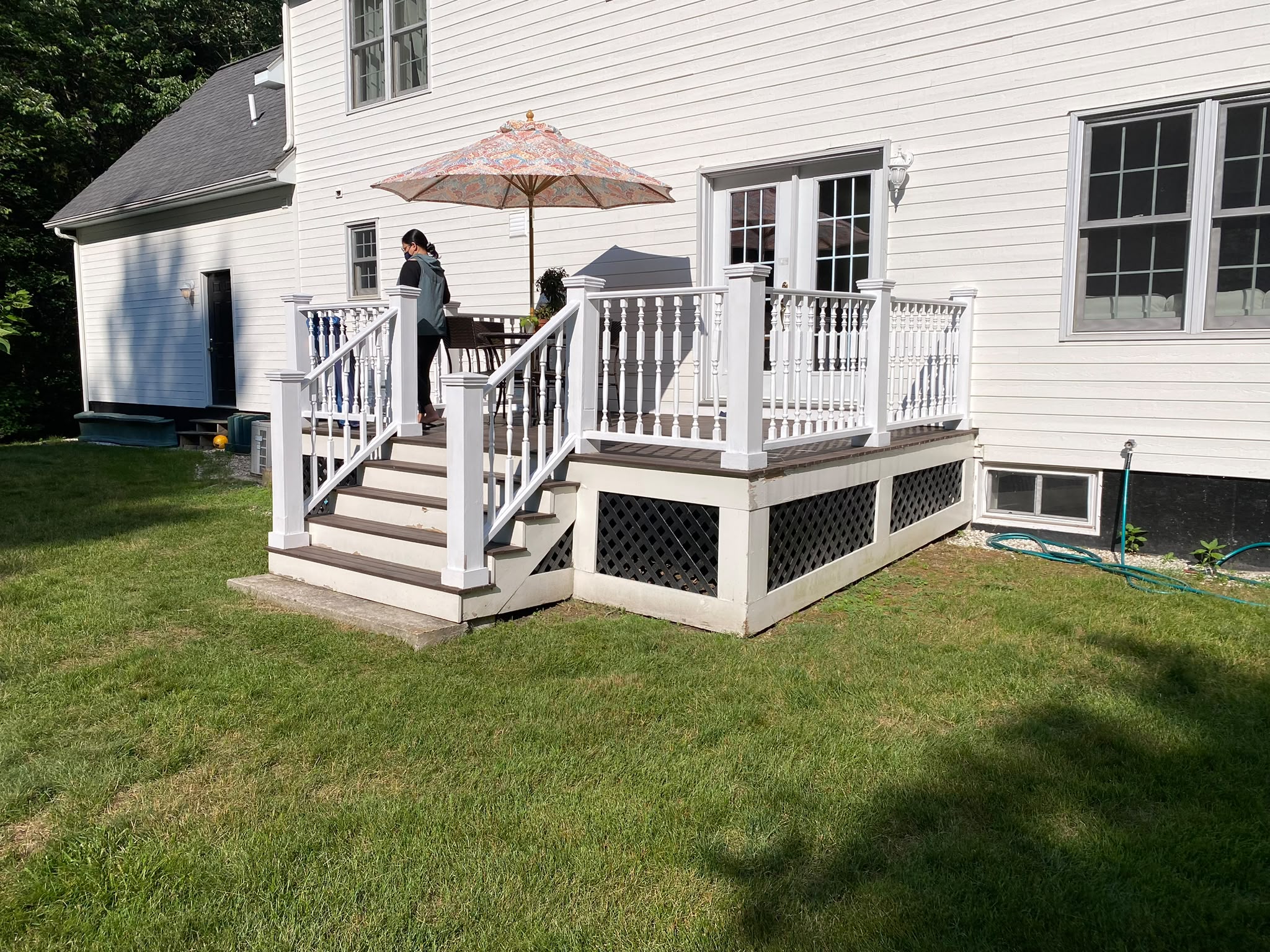 Composite deck with stairs and lattice skirting