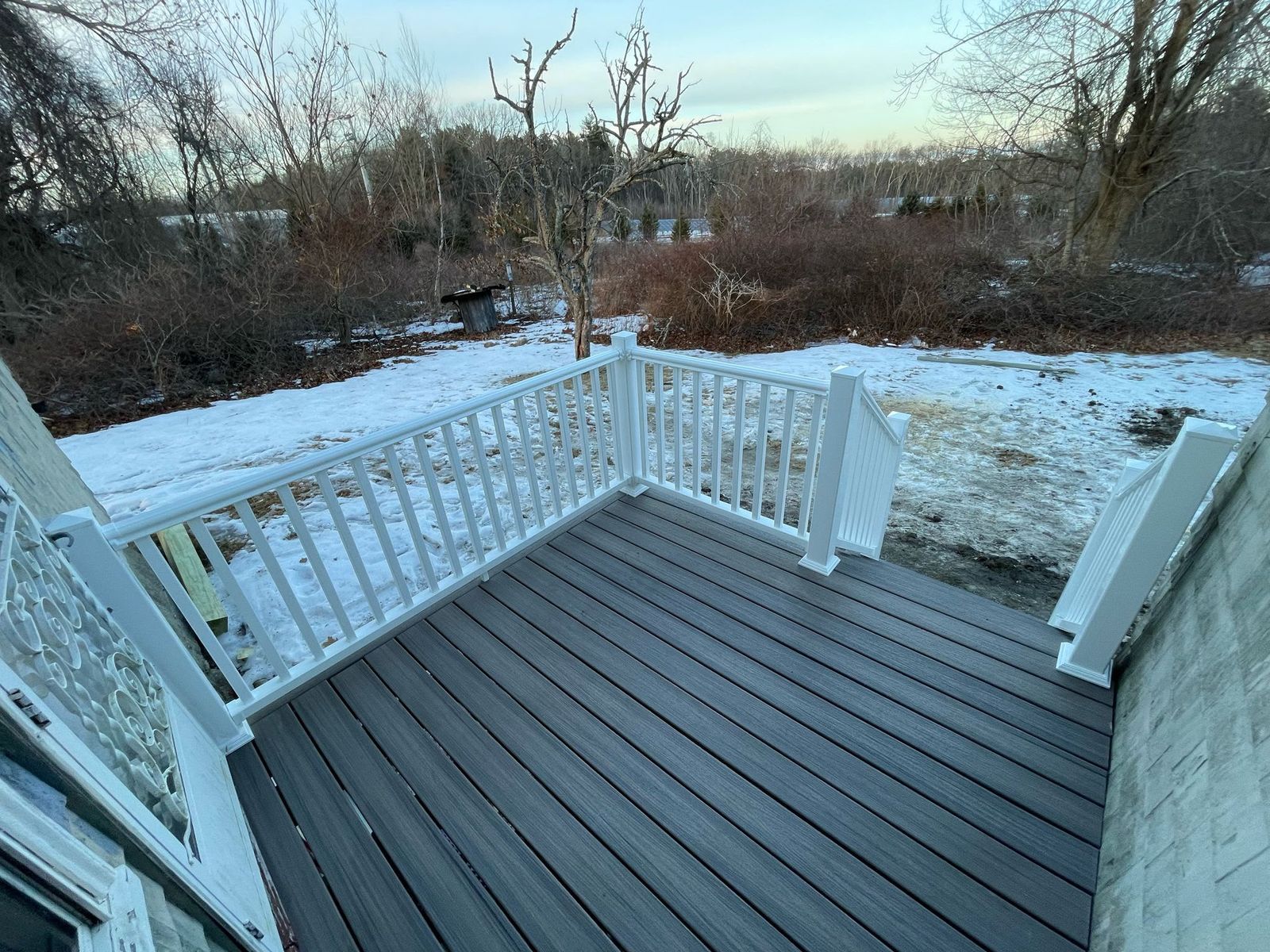 Composite deck in Massachusetts during winter snow