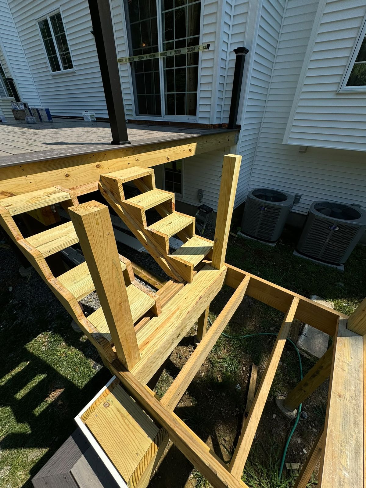 Deck stairs framing during construction — MetroWest Boston area